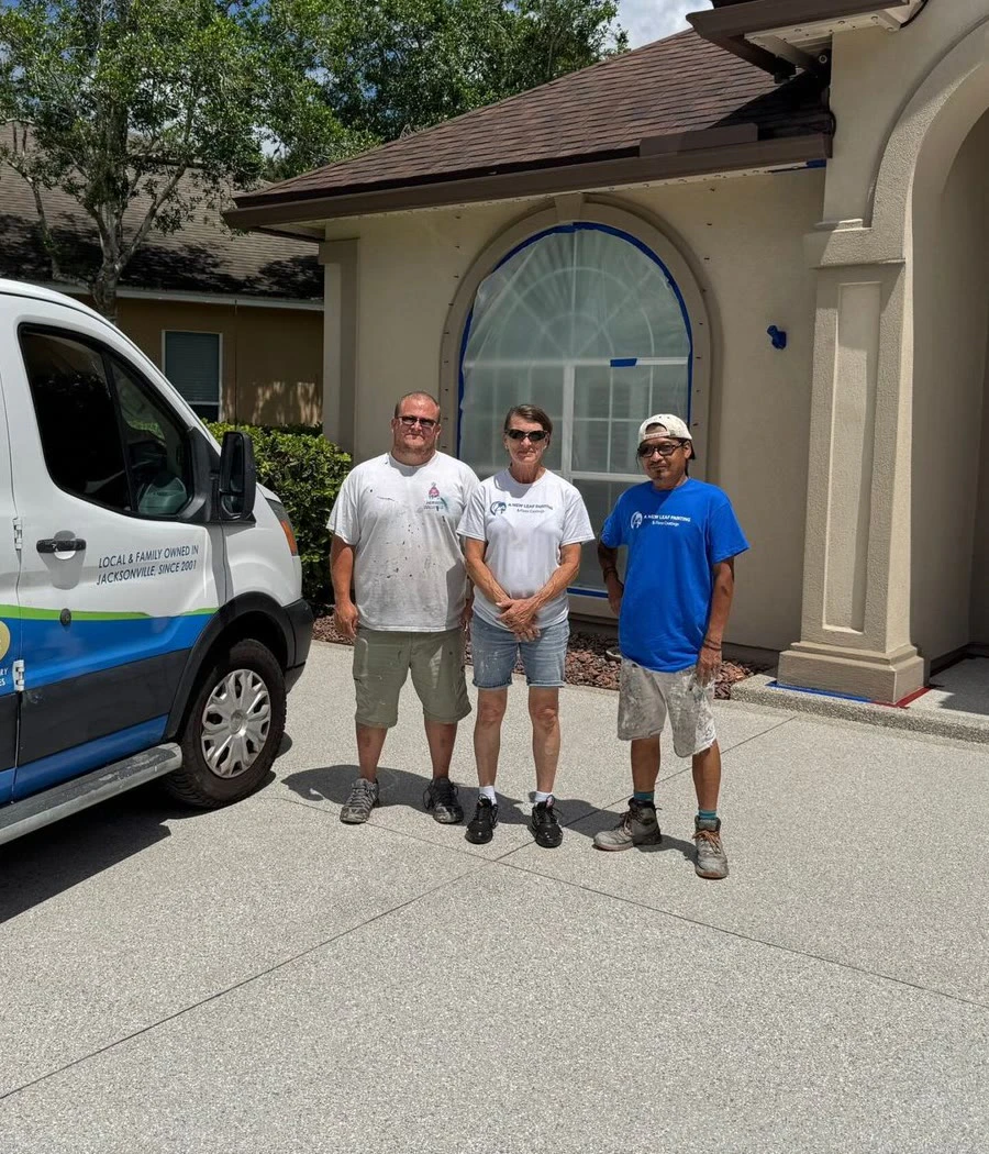 The A New Leaf Painting crew with their van outside a home in St. Johns, FL