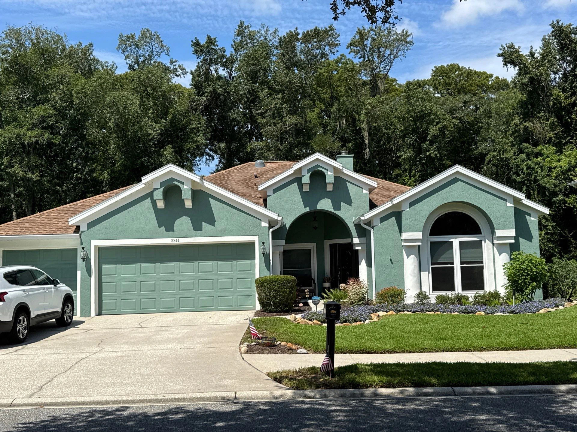 The Stucco Exterior Repainting with White Soffits & Fascia | Hampton Park, Jacksonville, FL in Jacksonville, FL
