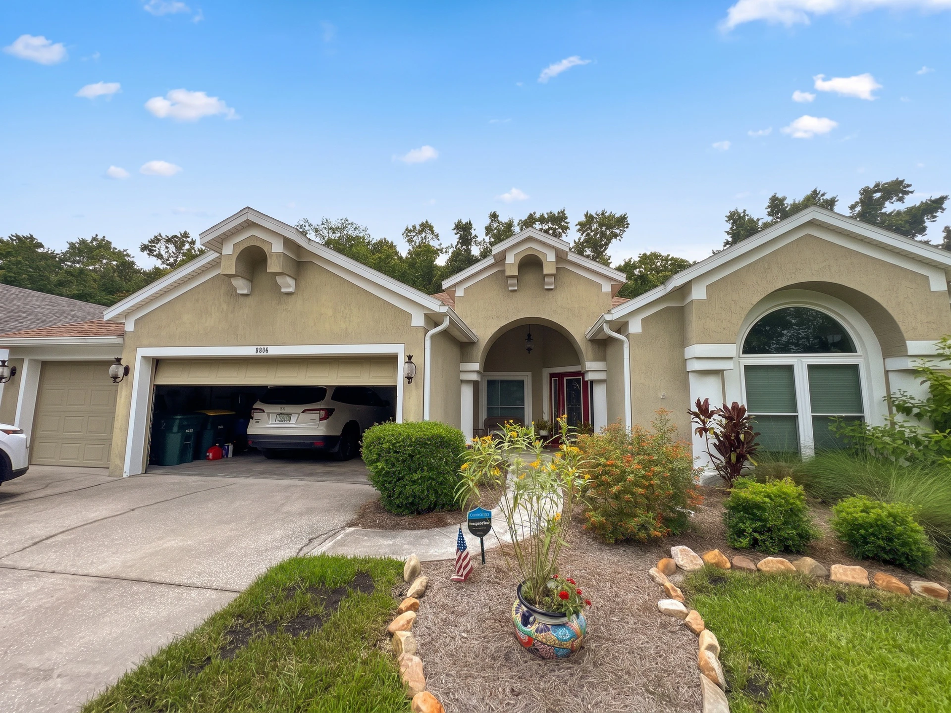 Before the Stucco Exterior Repainting with White Soffits & Fascia | Hampton Park, Jacksonville, FL in Jacksonville, FL
