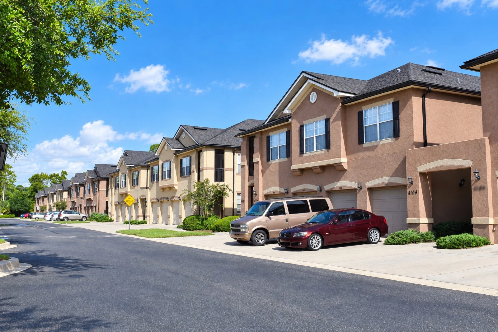 Row of townhomes after HOA exterior painting