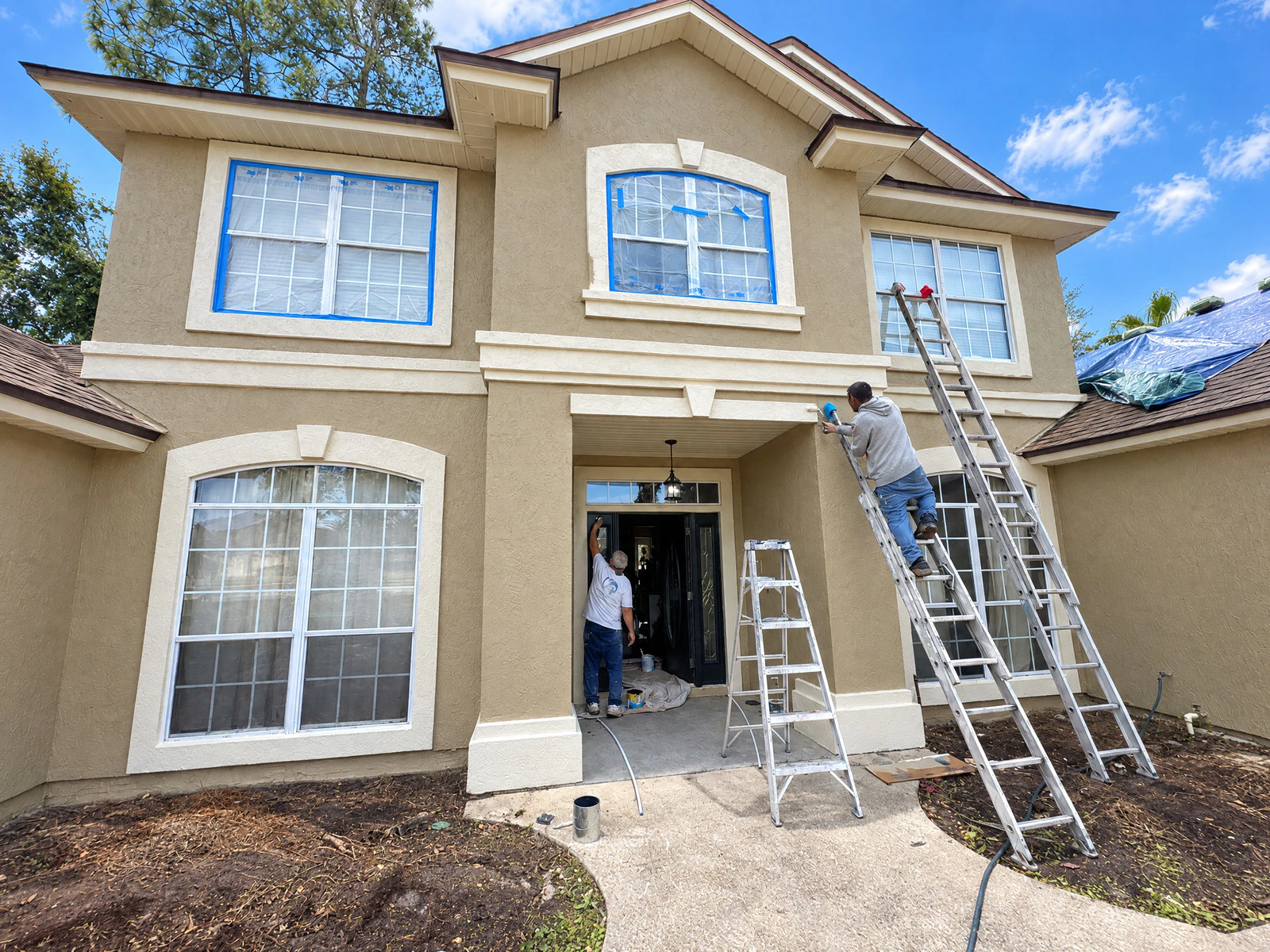 Exterior preparation underway on the front of a stucco home in Eagle Harbor, Fleming Island FL