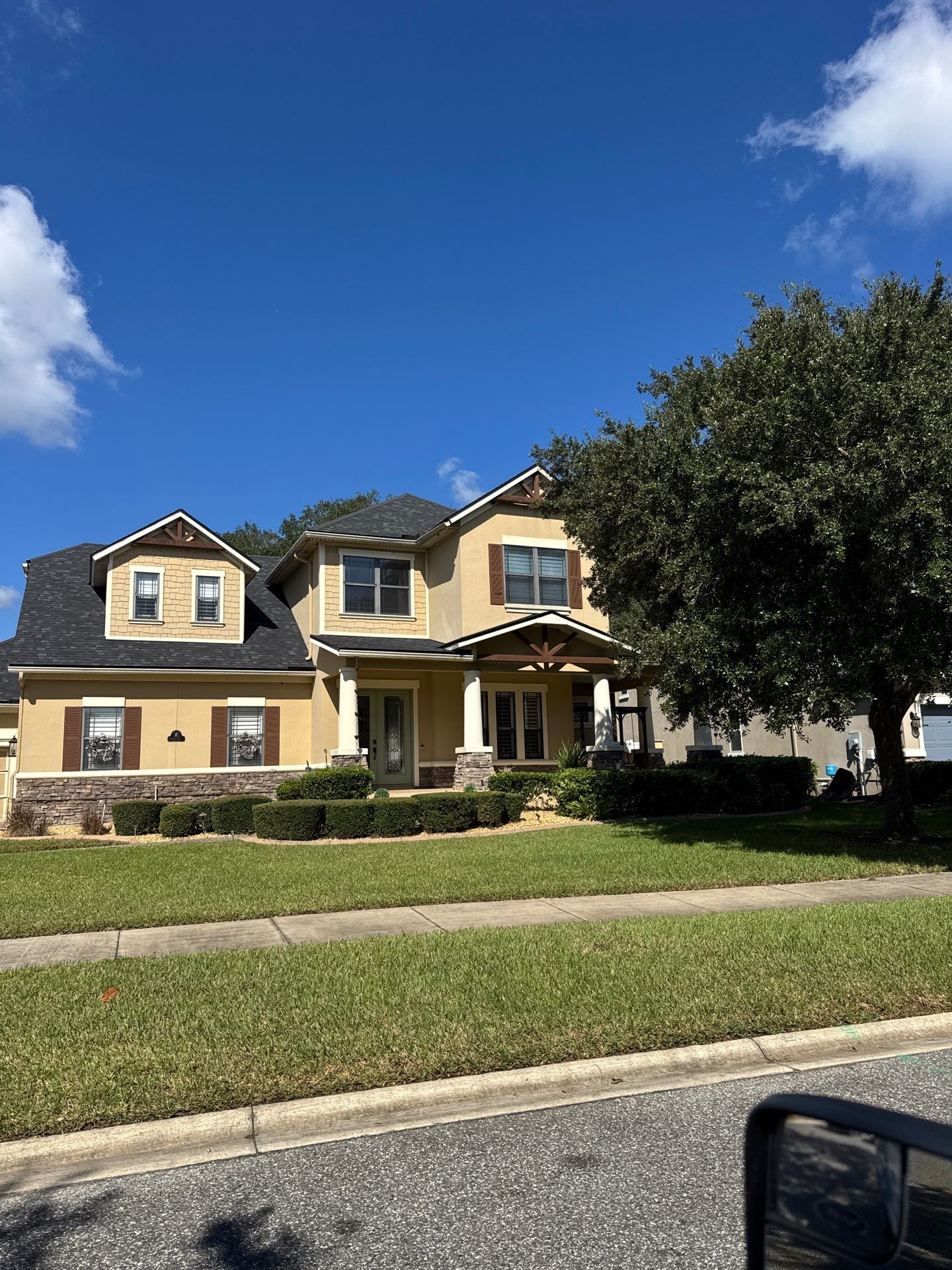 Stucco home in Tidewater, North Jacksonville FL 32226, after stucco crack repairs and exterior painting