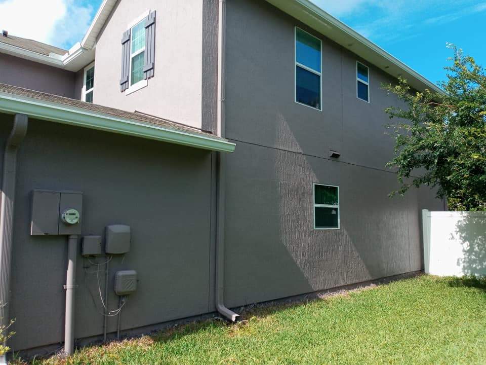 After the stucco crack repair and exterior repaint in Mandarin, FL