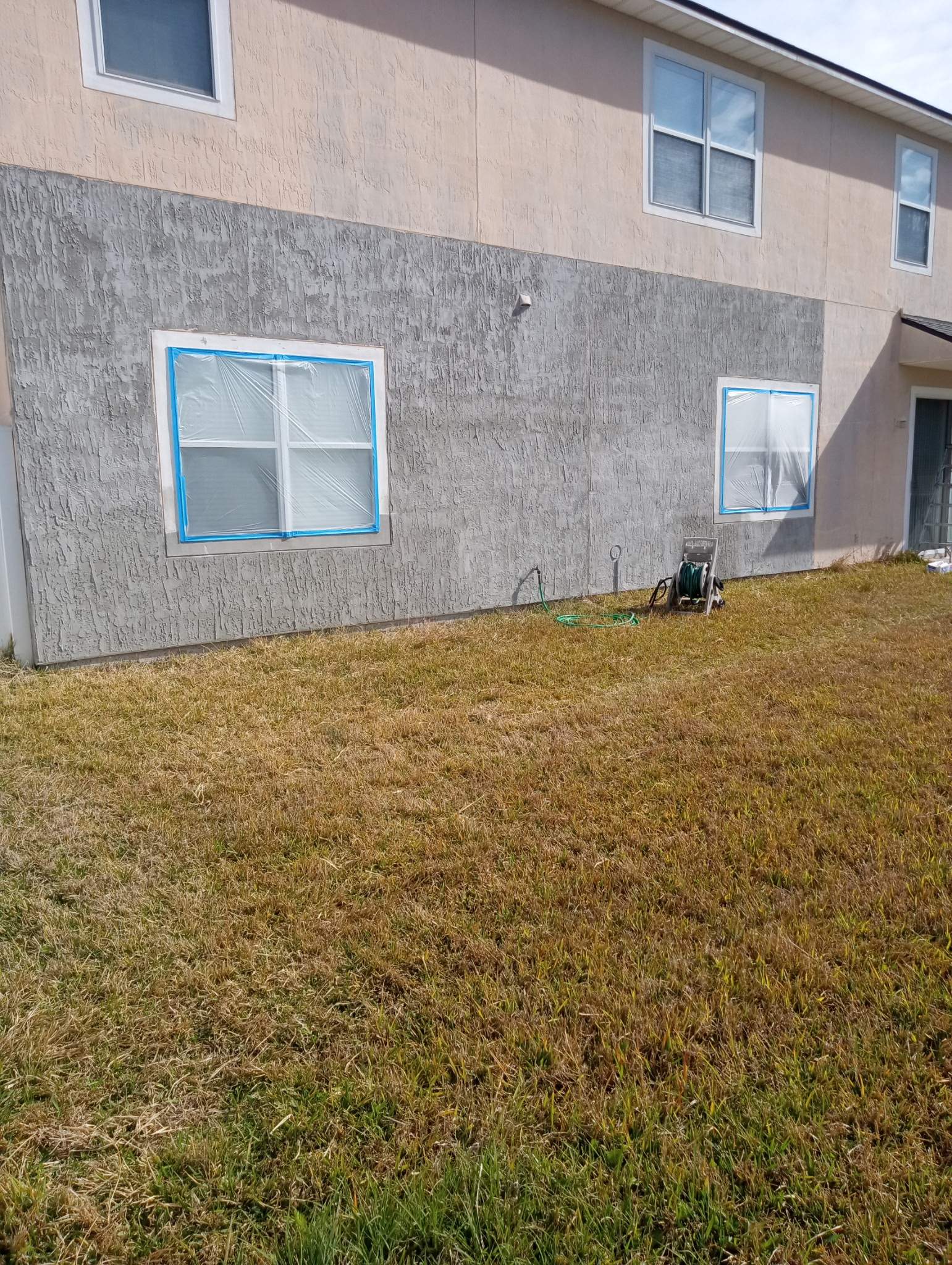 Before the Exterior Stucco Repair, Delamination & House Painting in Jacksonville, FL in Orange Park, FL