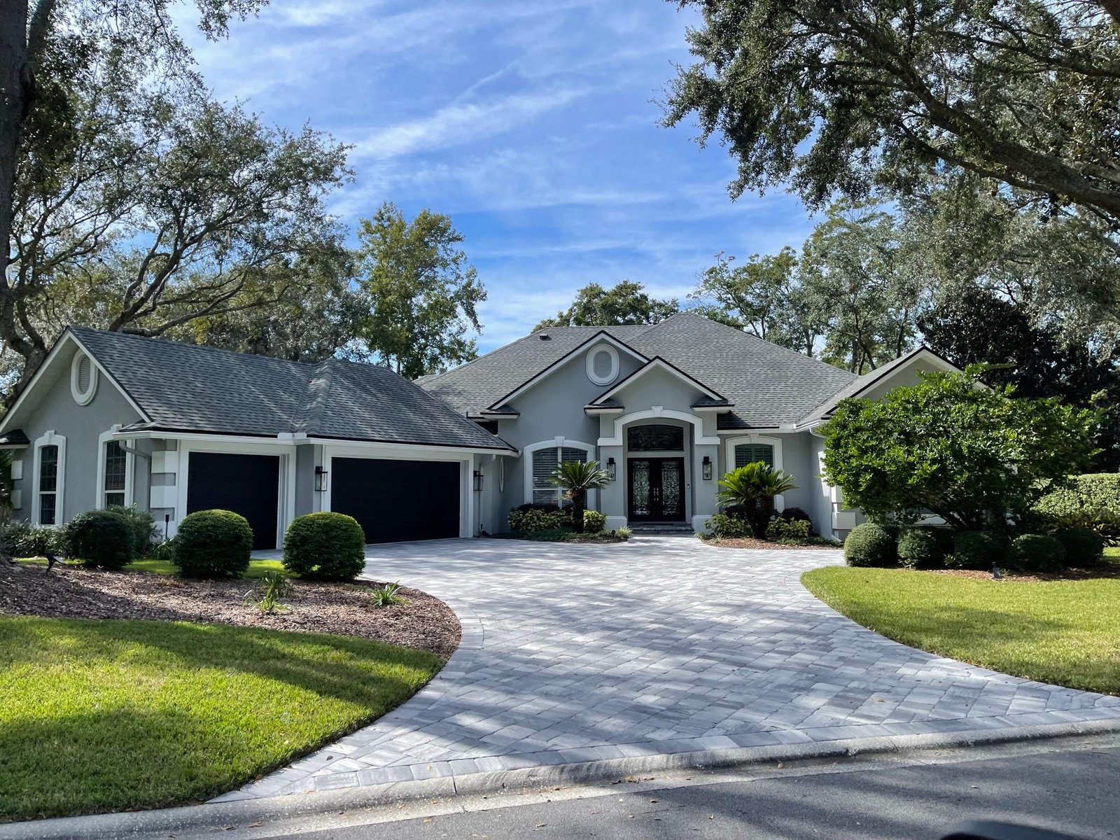 Exterior stucco painting near me, featuring detailed preparation, clean lines, and a durable professional finish