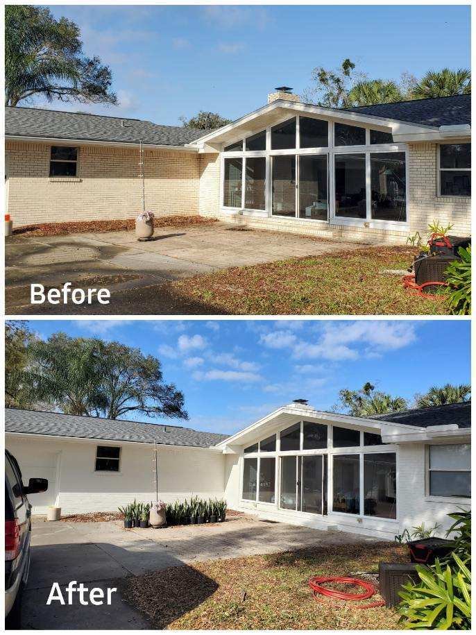 brick house painted white before and after