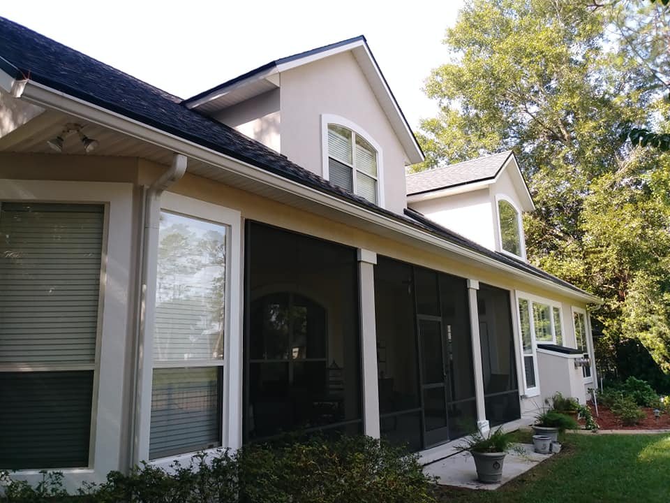 Tellmen exterior painting prep work in Eagle Harbor Fleming Island FL with masking and surface preparation