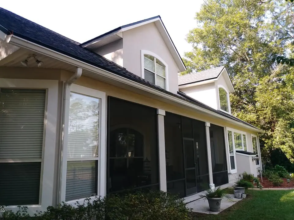 Tellmen exterior painting prep work in Eagle Harbor Fleming Island FL with masking and surface preparation