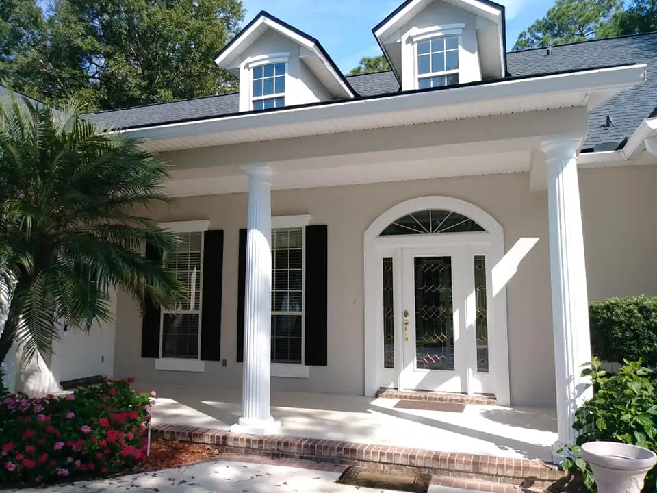 Exterior stucco painting project completed by A New Leaf Painting in Eagle Harbor, Fleming Island FL 32003