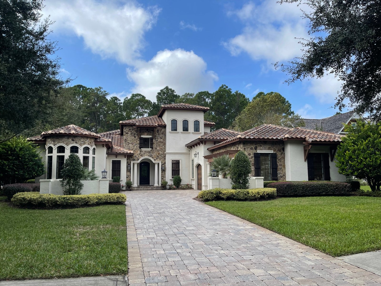 Luxury stucco home after exterior painting in King and Bear at World Golf Village