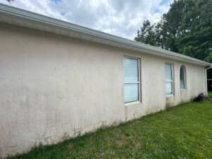 Exterior paint fading, caulking, gaps and joints professionally caulked and sealed as part of preparation for a Jacksonville exterior painting project.