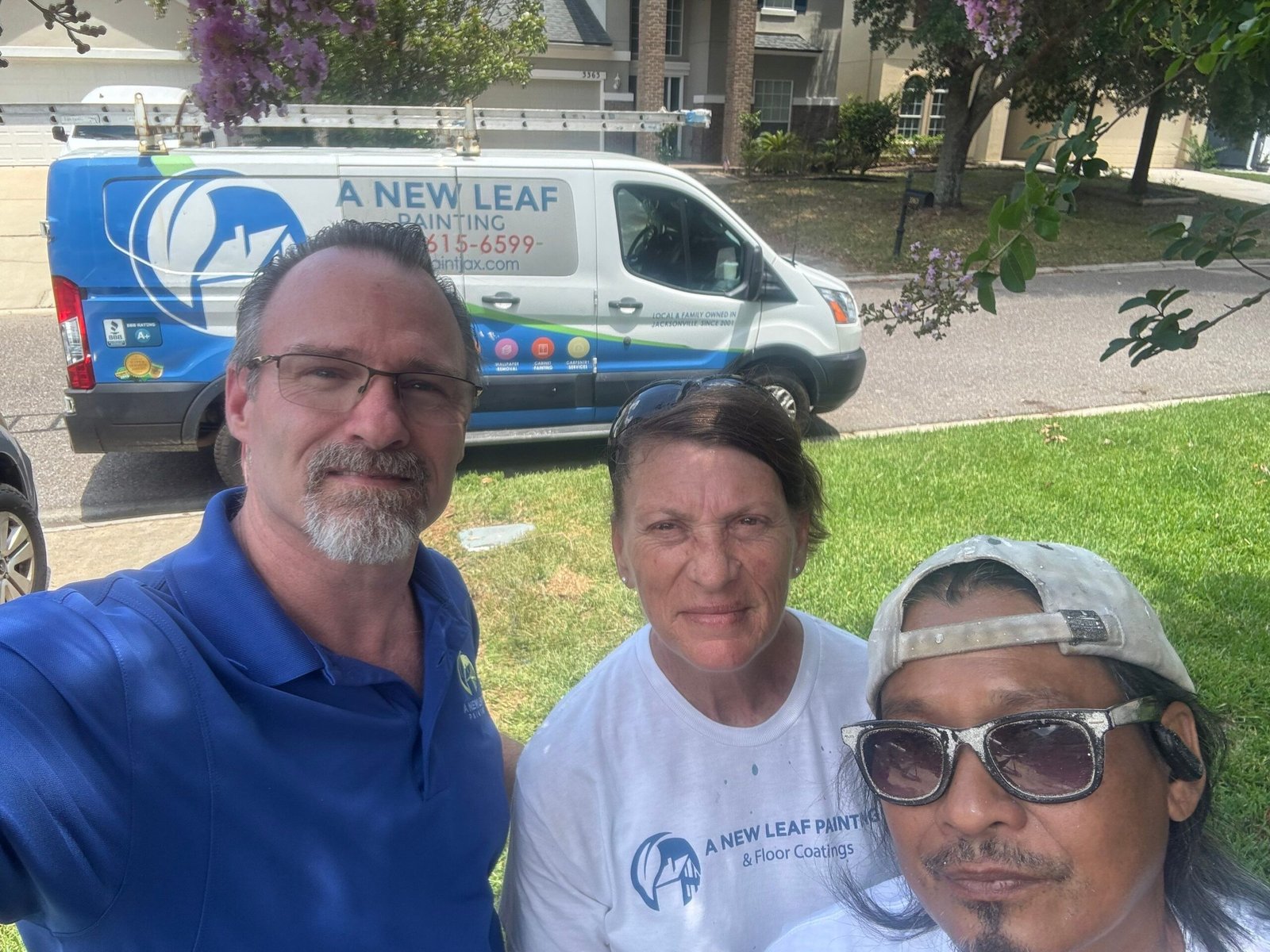 The crew onsite exterior painting with repaired cracks, architectural bands and trim on a Magnolia Point home in Green Cove Springs FL