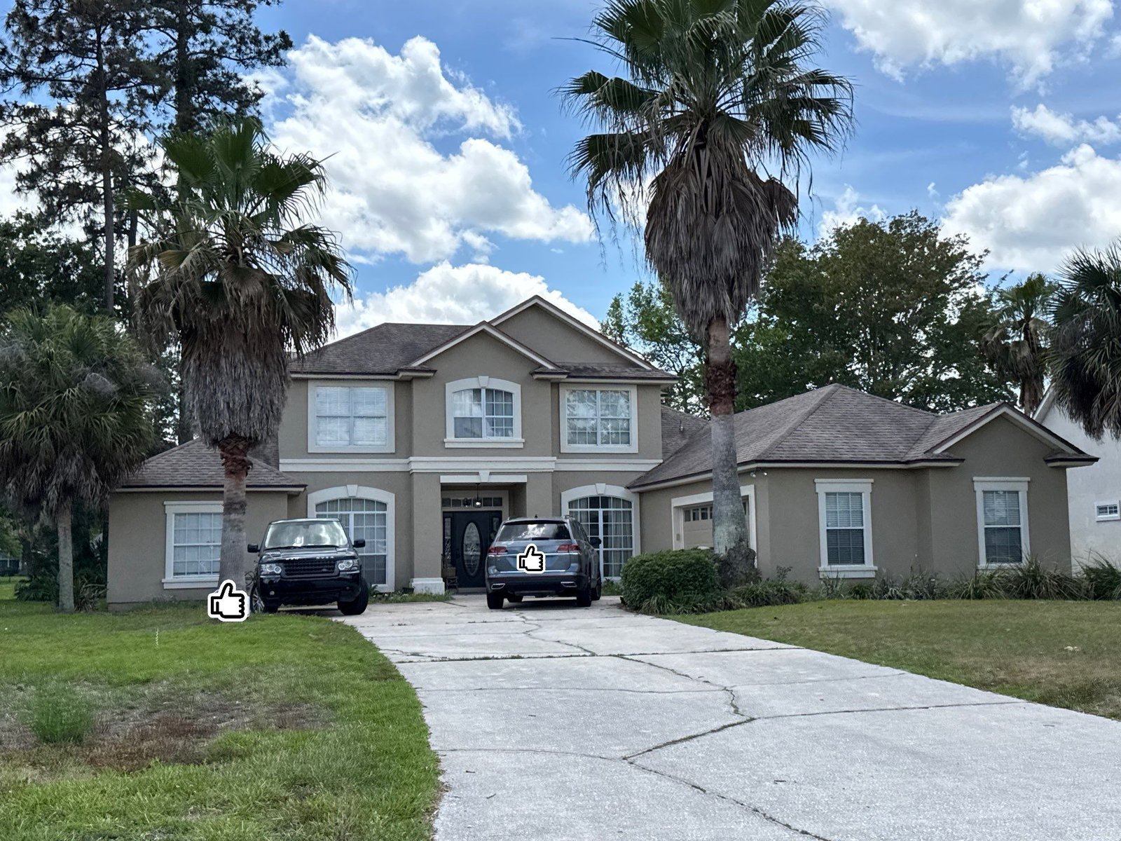 Finished Stucco Exterior — Eagle Harbor Fleming Island Completed stucco exterior after painting on a home in Eagle Harbor, Fleming Island FL