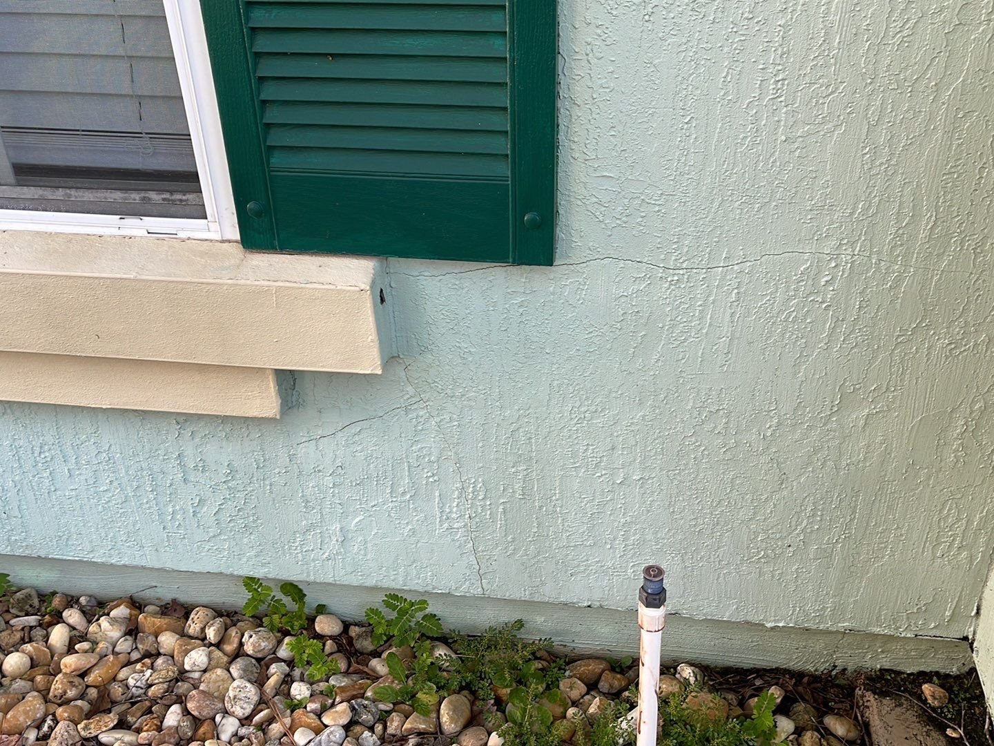 Exterior stucco cracking house painting
