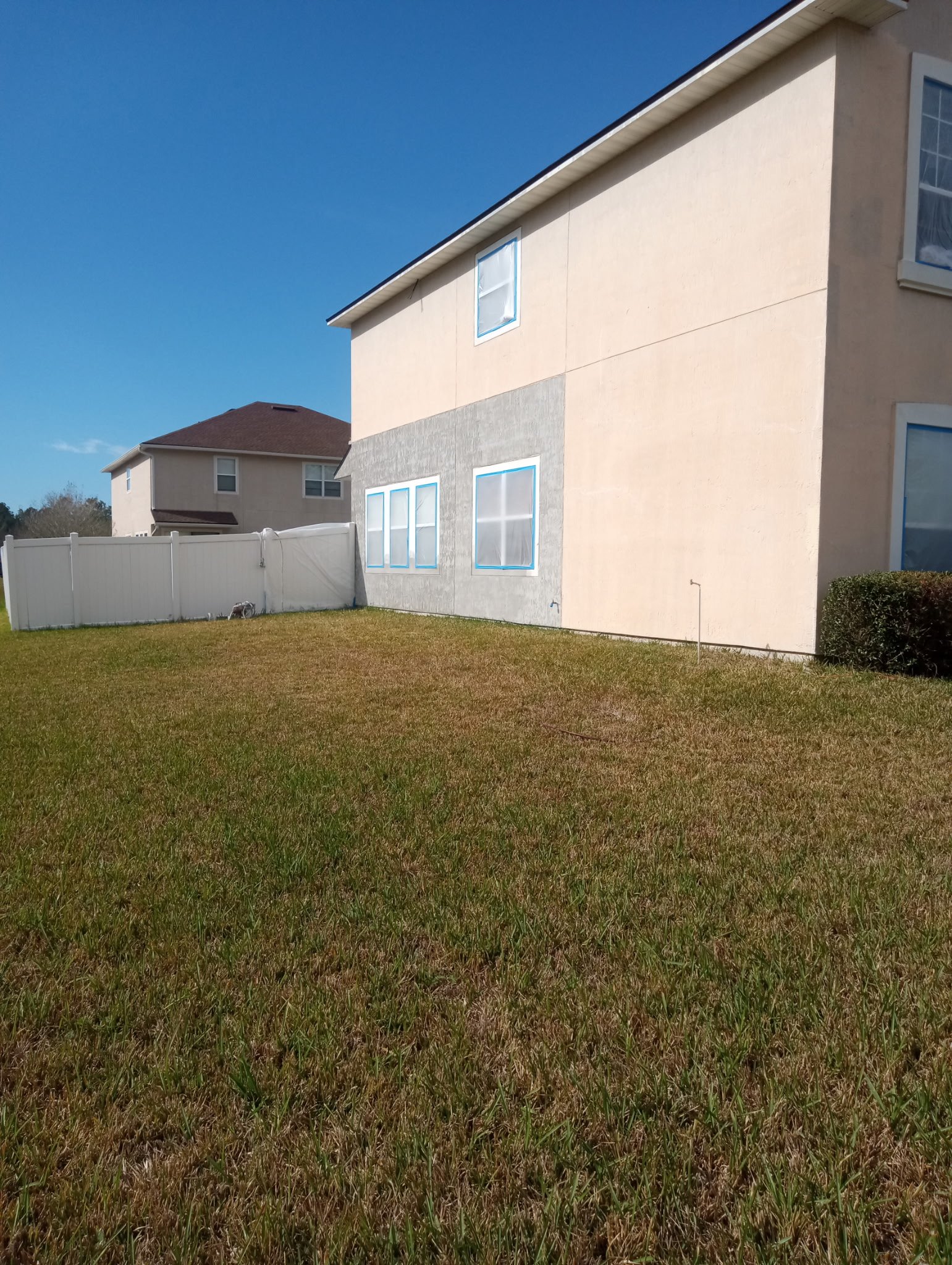 Repaired stucco wall textured and ready for priming and paint