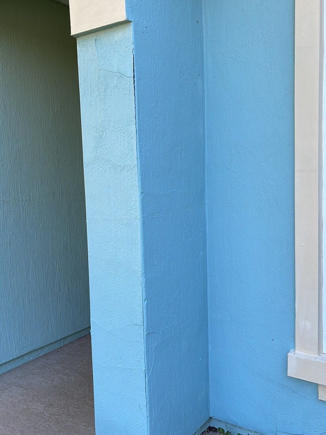 Stucco crack repair in Jacksonville Florida before exterior painting